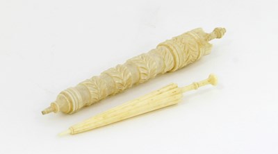 Lot 647 - A 19th Century carved ivory needle case,...