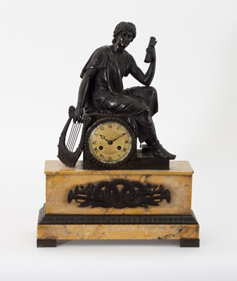 Lot 652 - An early 19th Century French mantel clock,...