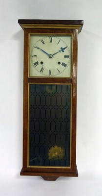 Lot 658 - An American wall clock in a rectangular case,...