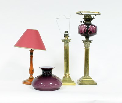 Lot 660 - An oil lamp with purple shade, amethyst glass...