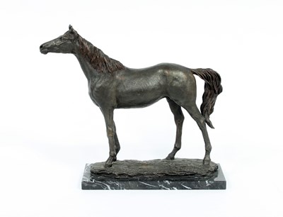 Lot 667 - A bronze resin figure of a standing horse,...