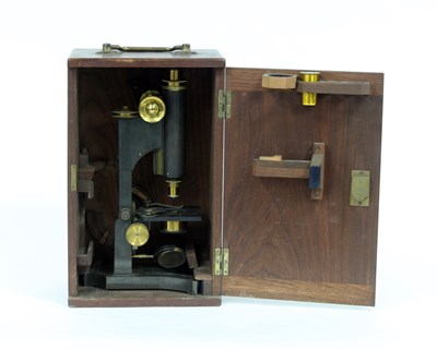 Lot 692 - An ebonised and brass mounted microscope by R...