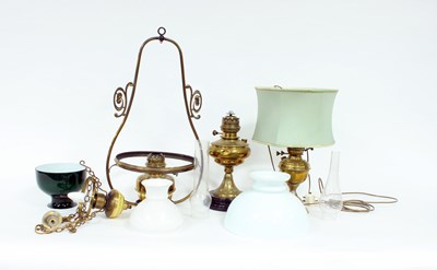 Lot 701 - A hanging brass lamp with opaque shade and two...