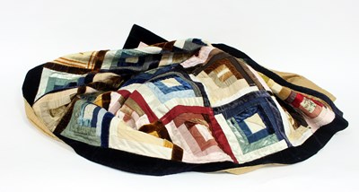 Lot 728 - A patchwork quilt, 222cm x 216cm