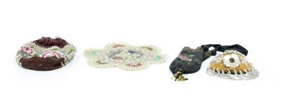 Lot 732 - Two beadwork bags, a beadwork mat and a pouch