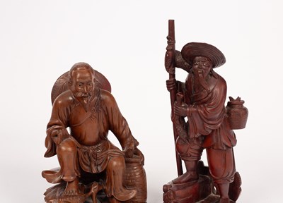 Lot 11 - Two Chinese wooden carvings of fishermen