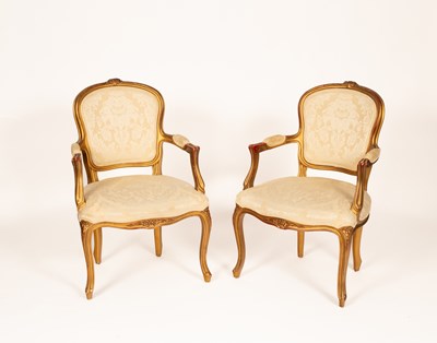 Lot 375 - A pair of Louis XV style armchairs