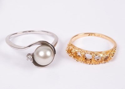 Lot 115 - A 14ct white gold, pearl and diamond ring