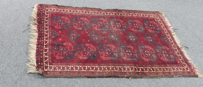 Lot 17 - A Hamadan rug, the crimson ground with twelve...