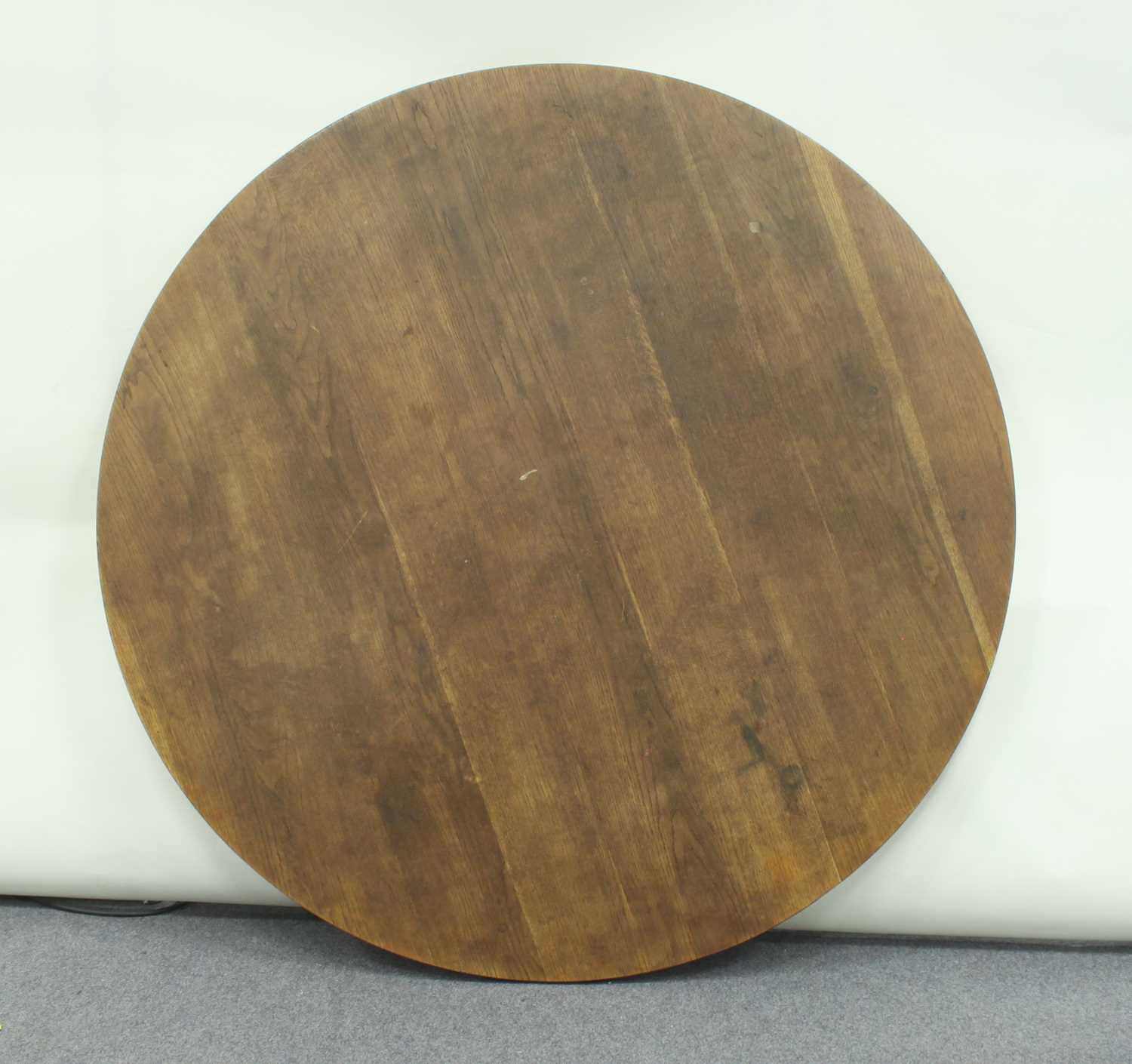 Lot 29 - A circular oak table top, 134cm diameter