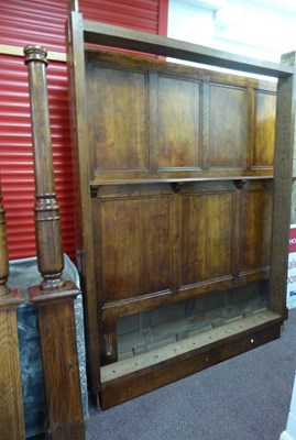 Lot 30 - A modern oak four-poster bed frame with...