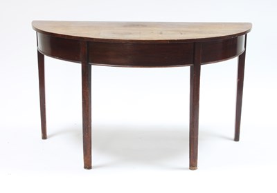 Lot 35 - A George III mahogany semi-circular table, on...