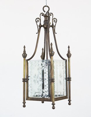 Lot 46 - An engraved glass and brass hall lantern of...