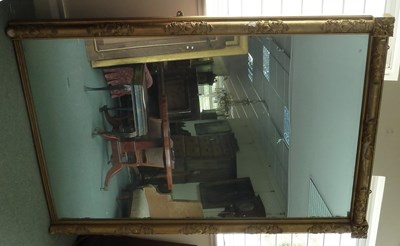 Lot 55 - A very large William IV plaster gilt mirror in...