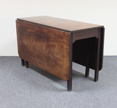 Lot 56 - A mahogany centre section of a dining table on...