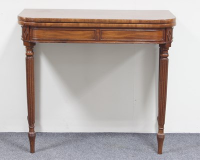 Lot 59 - A mahogany D-shaped tea table with panelled...