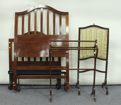 Lot 63 - An Edwardian towel rail, 69cm wide, a fire...