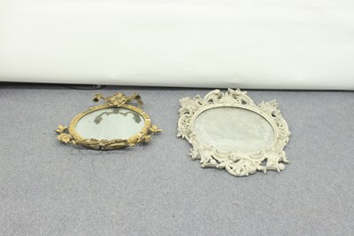 Lot 65 - A carved pine and painted rococo mirror, with...