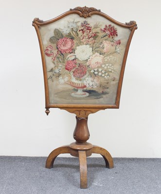 Lot 69 - A Victorian oak pole screen with plush work...