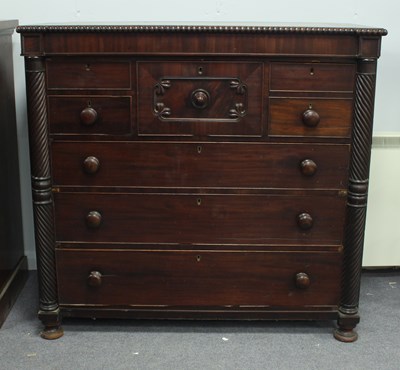 Lot 71 - A mahogany chest of drawers with gadrooned top,...