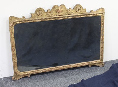 Lot 83 - A Queen Anne carved and gilt gesso wall mirror,...