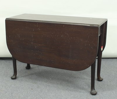 Lot 88 - A George III mahogany oval drop-leaf table, on...