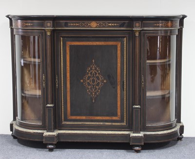 Lot 105 - A Victorian ebonised credenza with inlaid door...