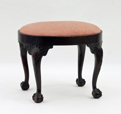 Lot 111 - A George II style mahogany stool, of oval form...