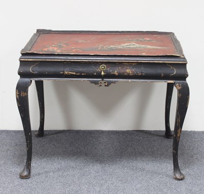 Lot 122 - An 18th Century style black japanned table...