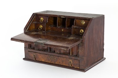 Lot 126 - A Queen Anne miniature bureau, the hinged...