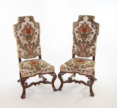 Lot 130 - A pair of early 18th Century walnut side...