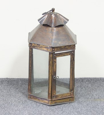 Lot 138 - A hexagonal brass lantern, 40cm high