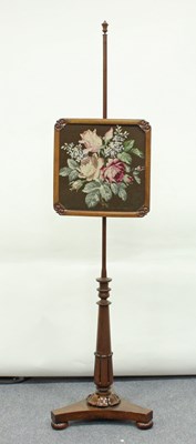 Lot 143 - A William IV rosewood pole screen, the lappet...