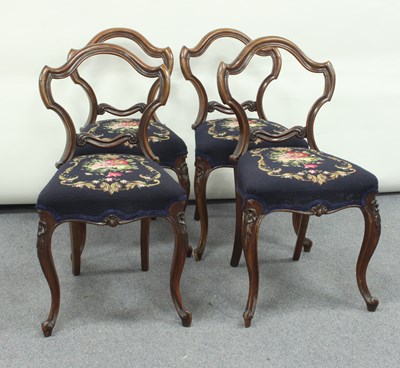 Lot 150 - A set of four Victorian walnut framed chairs,...