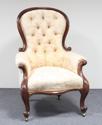 Lot 152 - A carved walnut framed armchair with button...