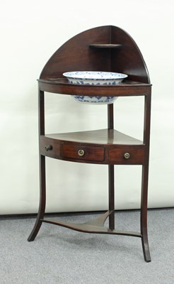 Lot 154 - A George III mahogany corner washstand, 108cm...