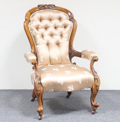 Lot 164 - A Victorian carved walnut framed open armchair...