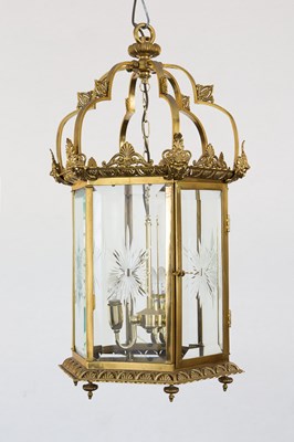 Lot 179 - A fine gilt metal hexagonal hall lantern cast...