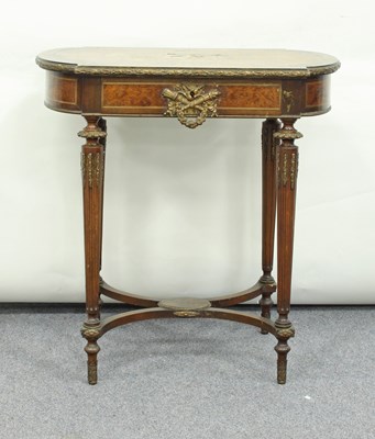 Lot 188 - An amboyna and walnut parcel-gilt work table...