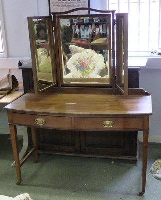 Lot 207 - An Edwardian mahogany bow-front dressing table...