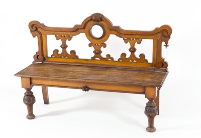 Lot 215 - A oak hall bench with open Gothic style back...