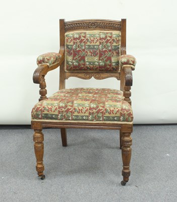 Lot 217 - A late 19th Century carved walnut framed armchair