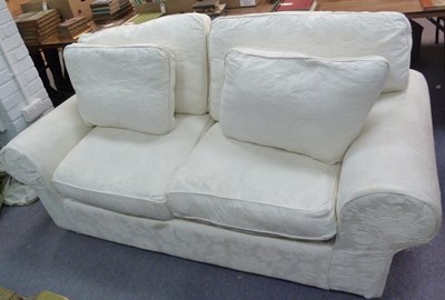 Lot 225 - An upholstered two-seater sofa/bed