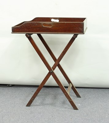 Lot 229 - A butler's mahogany tray and the stand for the...