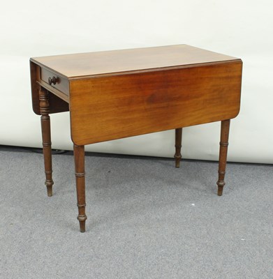 Lot 237 - A George IV mahogany two-flap table, fitted a...