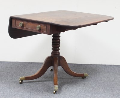 Lot 241 - A Regency mahogany two-flap table, fitted a...