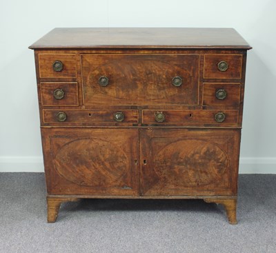 Lot 243 - A mahogany chest, fitted an arrangement of...