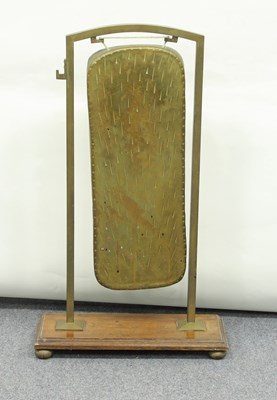 Lot 276 - A 1930s brass rectangular gong on a wooden...