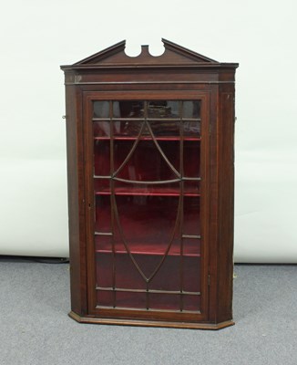 Lot 286 - A mahogany hanging corner cupboard with broken...