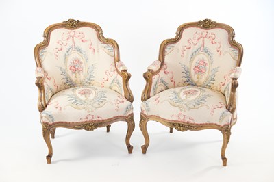 Lot 287 - A pair of Louis XVI style fauteuils with...